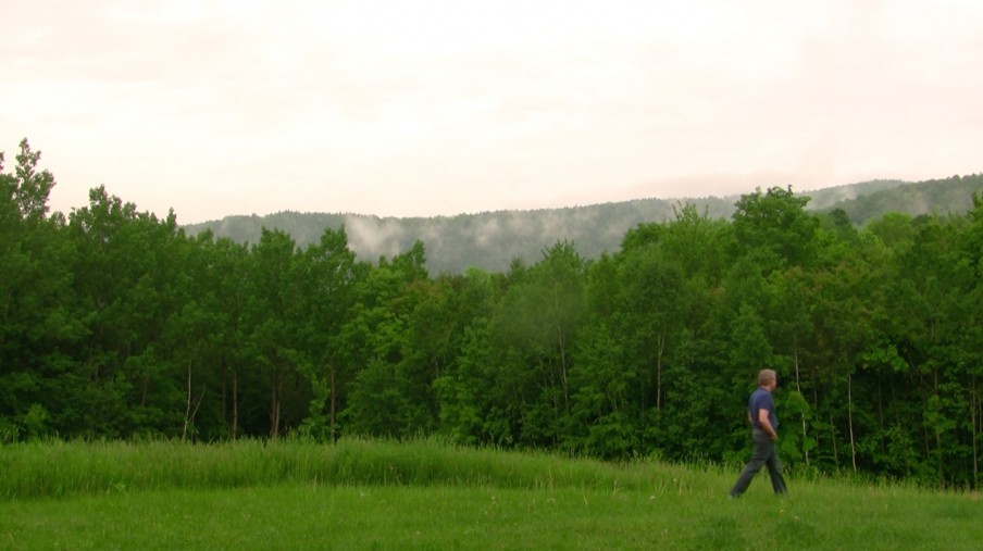 Chris Orcutt walking in Vermont's Green Mountains, photo by Chris Orcutt