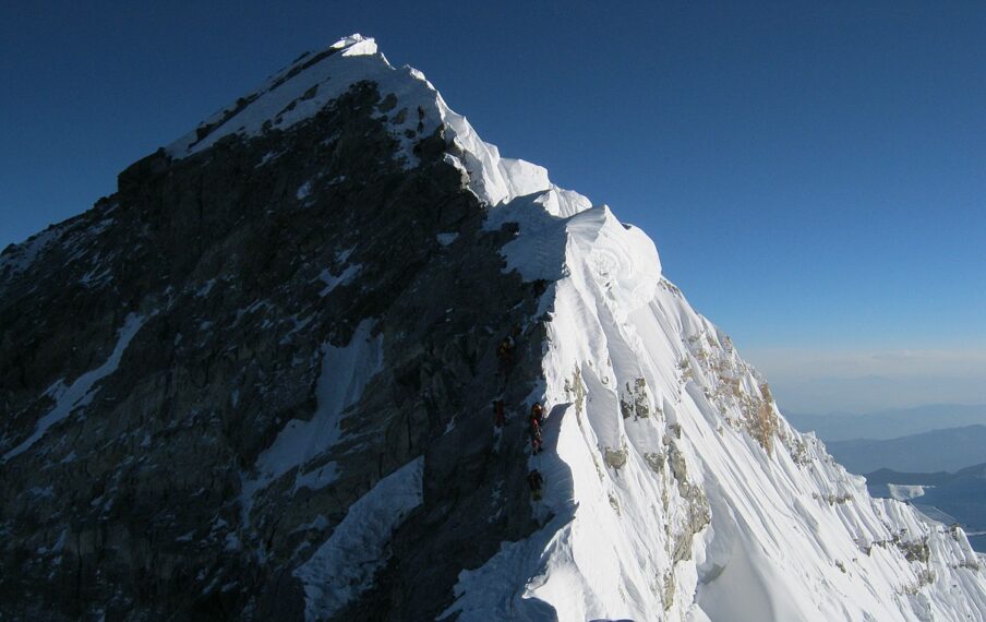 Climbers on Mt. Everest at the base of the Hillary Step.